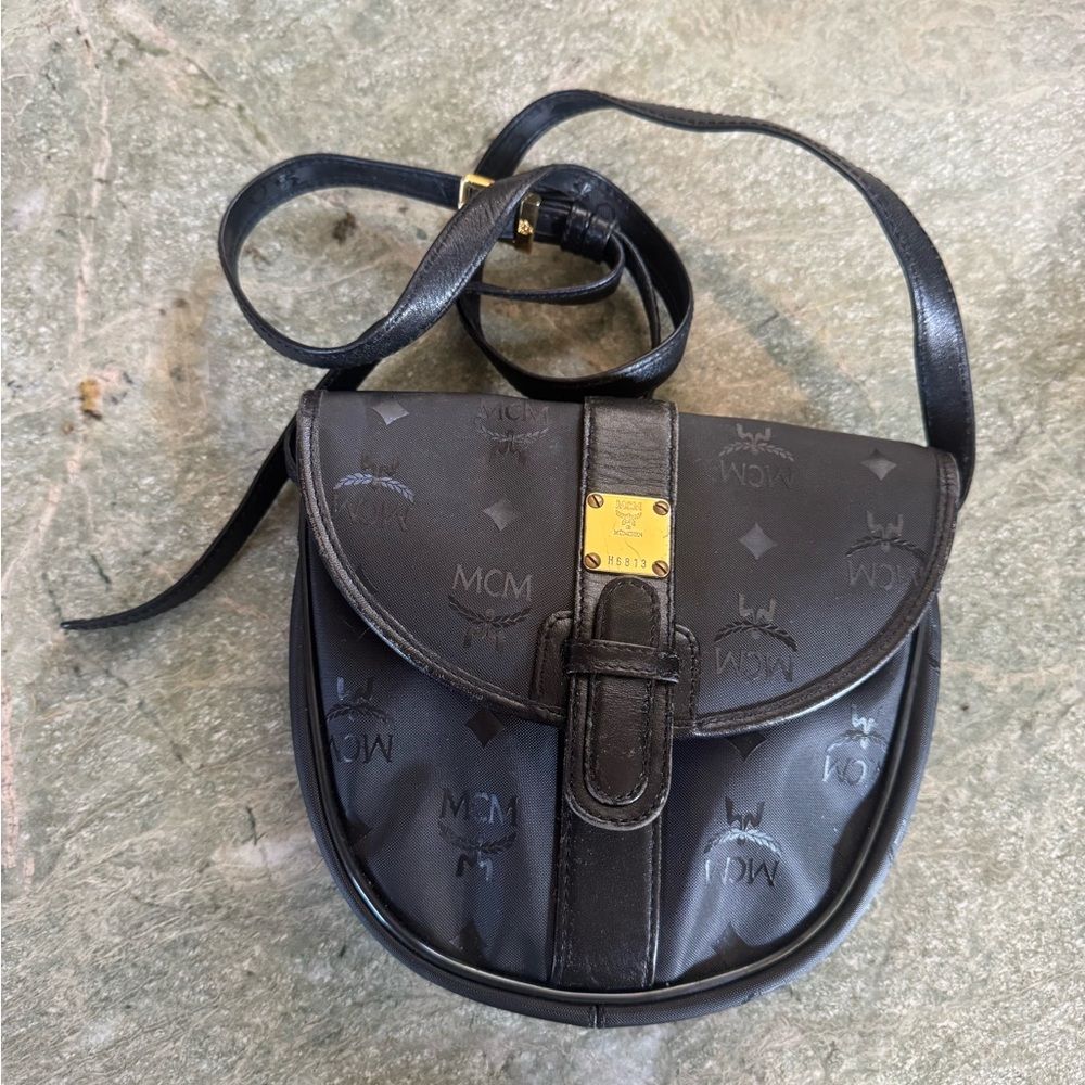 MCM Black Crossbody Saddle Bag with Gold Plaque
